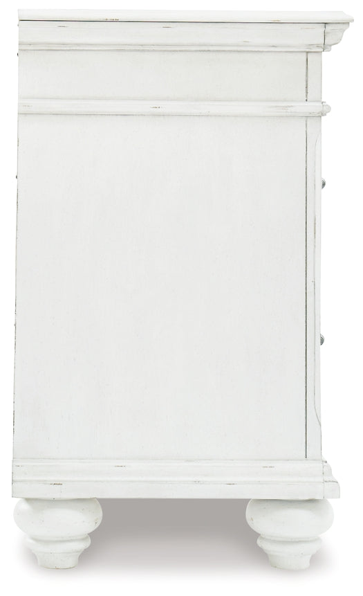 Kanwyn Three Drawer Night Stand - Discount Furniture Connection