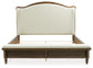 Sturlayne Queen Upholstered Panel Bed with Mirrored Dresser