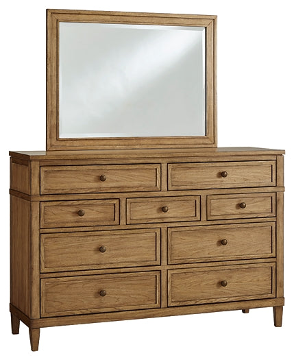 Sharlance California King Upholstered Panel Bed with Mirrored Dresser