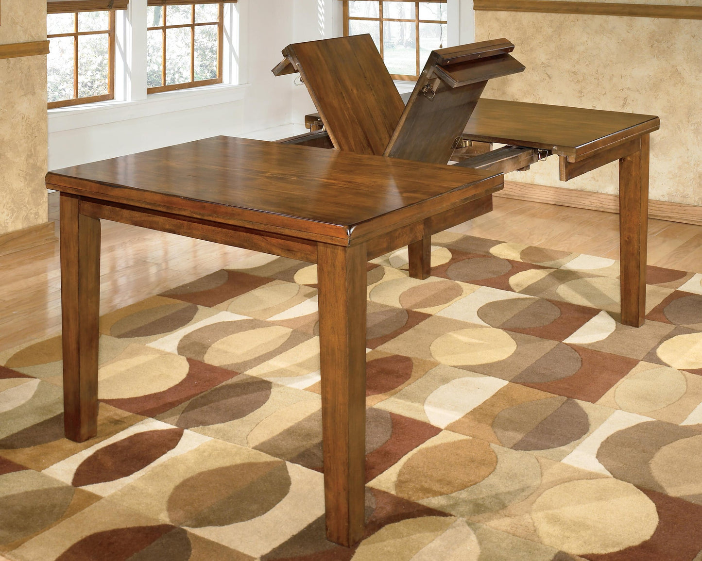Ralene RECT DRM Butterfly EXT Table - Discount Furniture Connection