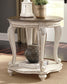 Realyn Round End Table - Discount Furniture Connection