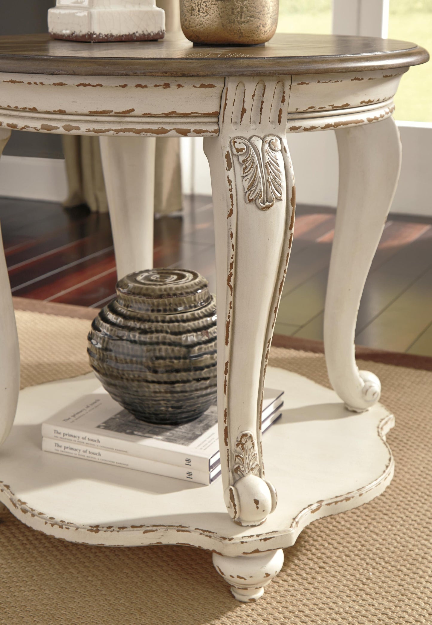 Realyn Round End Table - Discount Furniture Connection