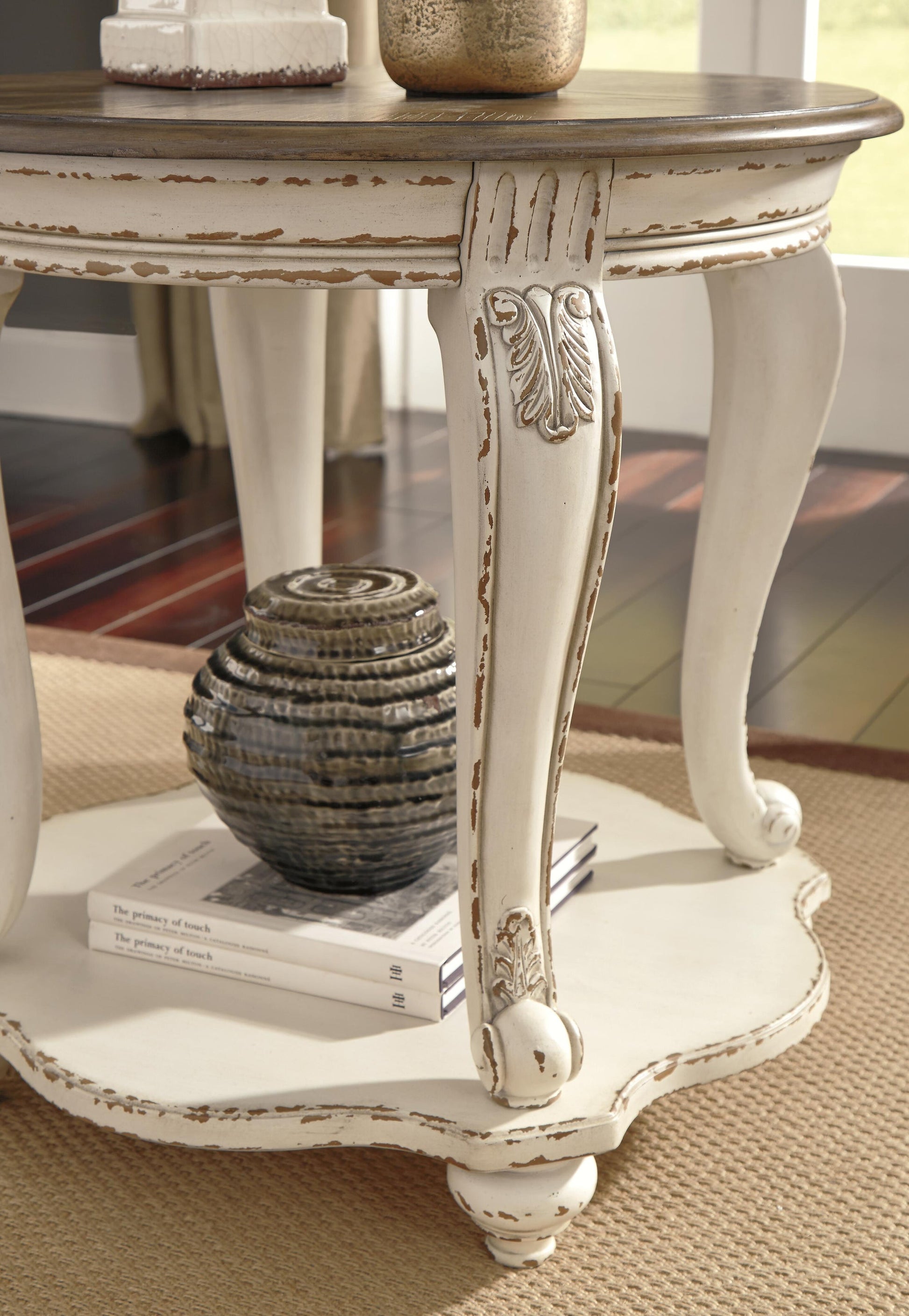 Realyn Round End Table - Discount Furniture Connection