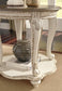 Realyn Round End Table - Discount Furniture Connection