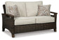 Paradise Trail Loveseat w/Cushion - Discount Furniture Connection
