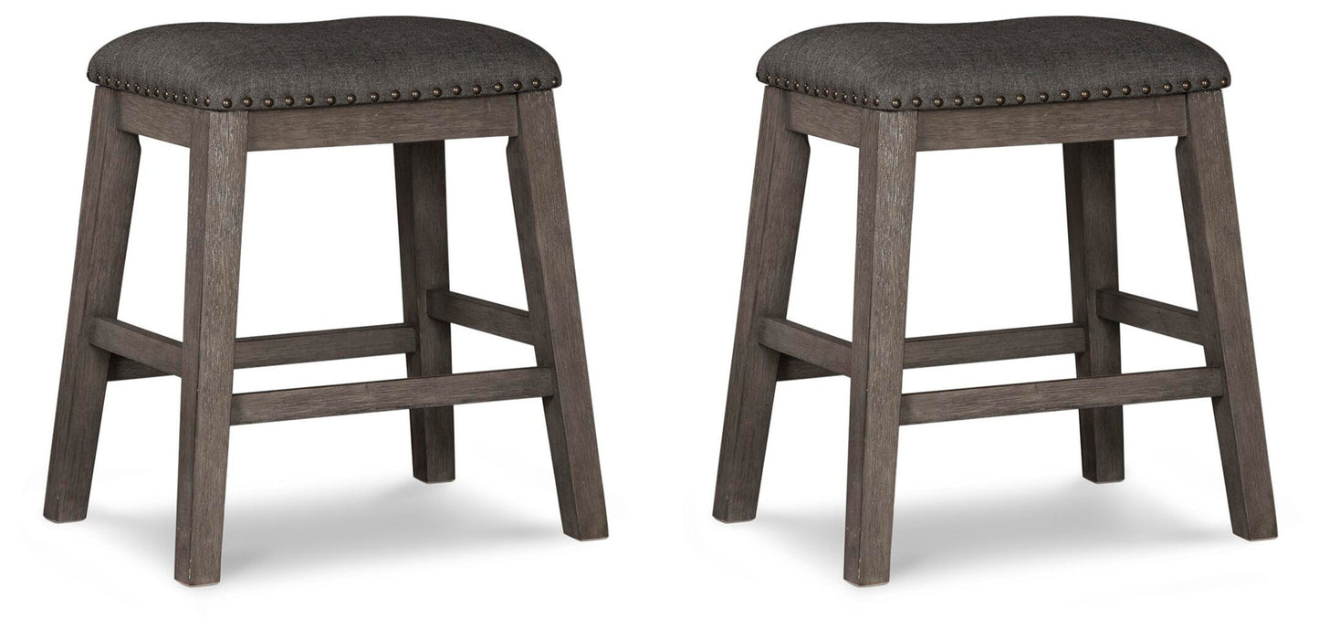 Caitbrook Upholstered Stool (2/CN) - Discount Furniture Connection