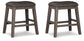 Caitbrook Upholstered Stool (2/CN) - Discount Furniture Connection