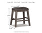 Caitbrook Upholstered Stool (2/CN) - Discount Furniture Connection