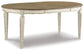 Realyn Oval Dining Room EXT Table - Discount Furniture Connection
