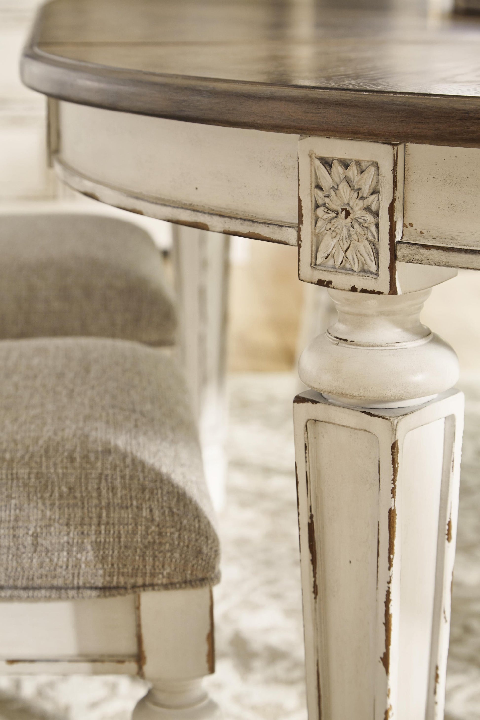 Realyn Oval Dining Room EXT Table - Discount Furniture Connection