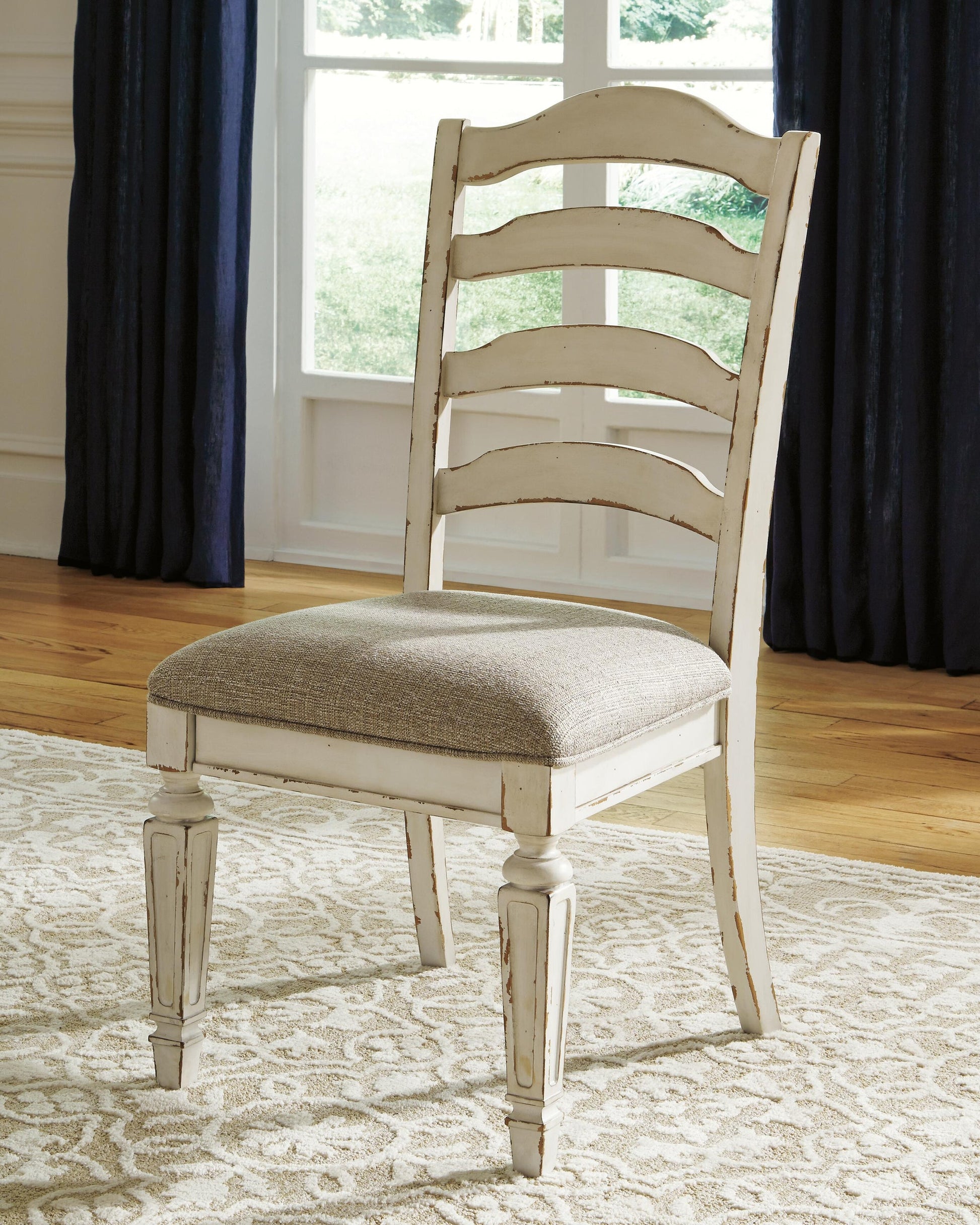 Realyn Dining UPH Side Chair (2/CN) - Discount Furniture Connection