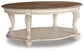 Realyn Oval Cocktail Table - Discount Furniture Connection