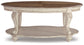 Realyn Oval Cocktail Table - Discount Furniture Connection