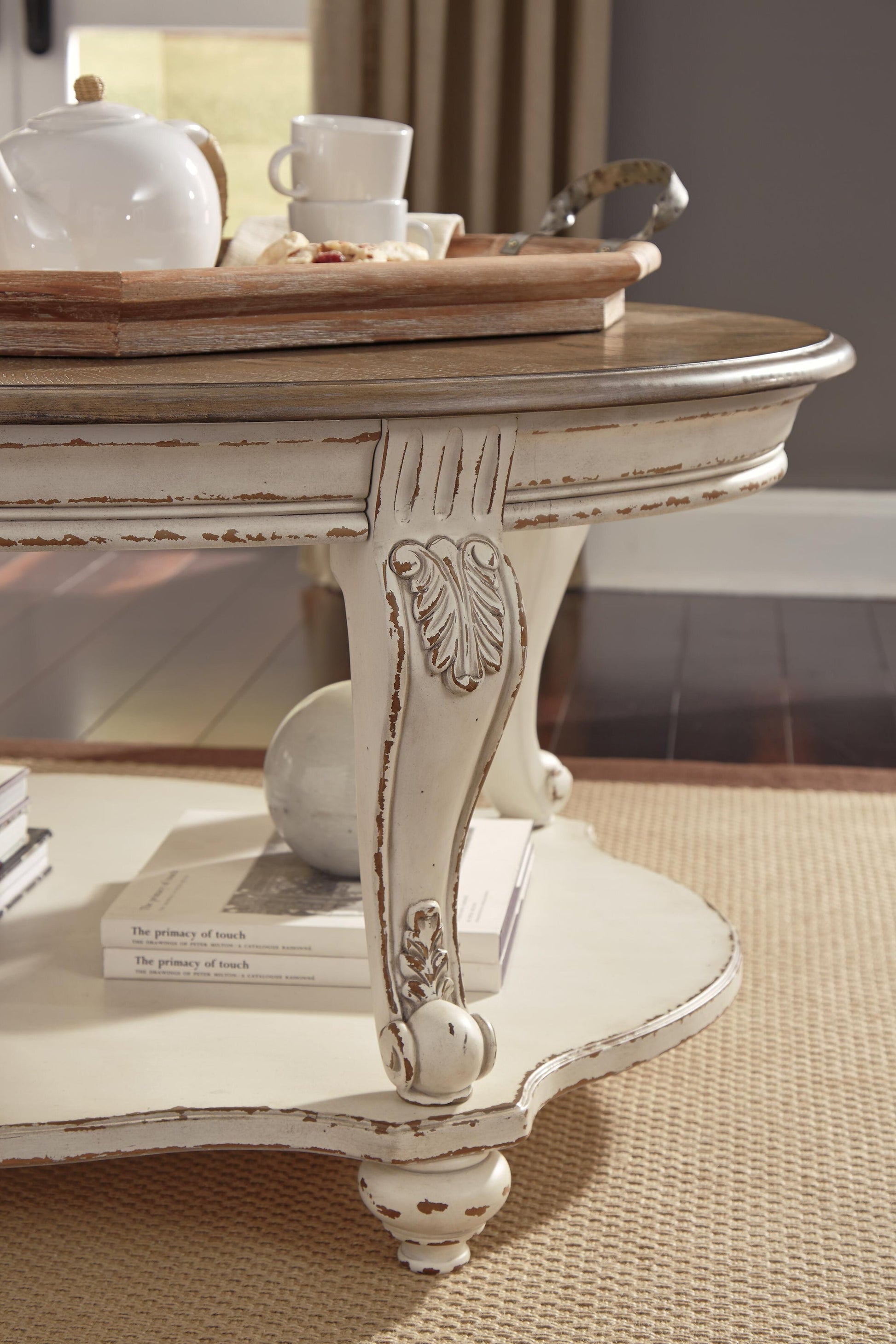 Realyn Oval Cocktail Table - Discount Furniture Connection