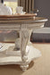 Realyn Oval Cocktail Table - Discount Furniture Connection