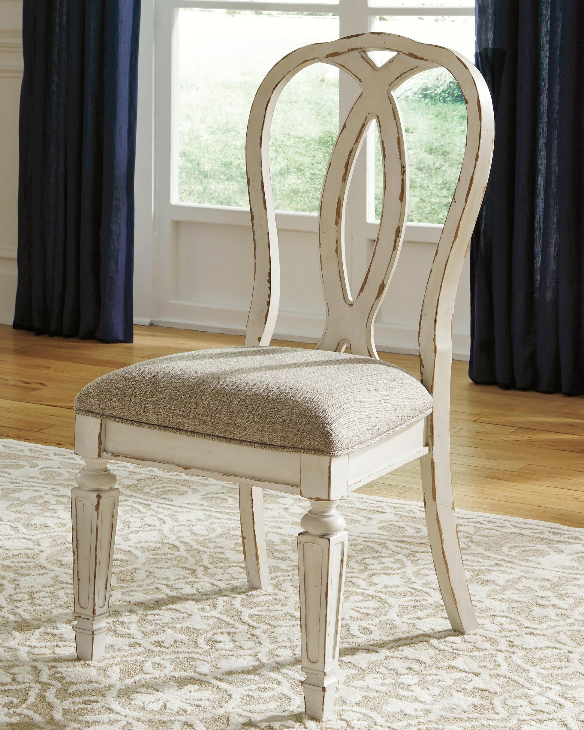 Realyn Dining UPH Side Chair (2/CN) - Discount Furniture Connection