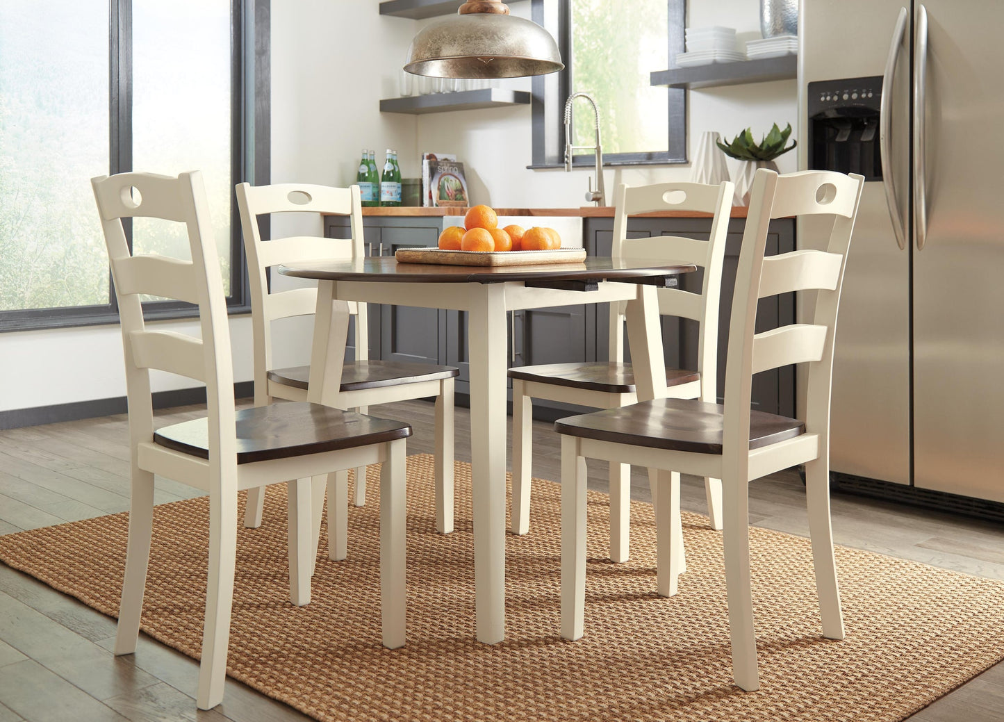 Woodanville Round DRM Drop Leaf Table - Discount Furniture Connection
