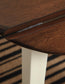 Woodanville Round DRM Drop Leaf Table - Discount Furniture Connection