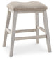 Skempton Upholstered Stool (2/CN) - Discount Furniture Connection