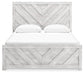 Cayboni Queen Panel Bed with Mirrored Dresser - Discount Furniture Connection