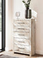 Lawroy King Panel Bed, Dresser, Mirror, Chest and Nightstand