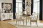 Realyn Oval Dining Room EXT Table - Discount Furniture Connection